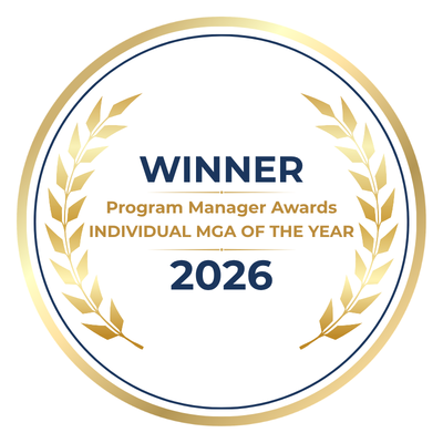 Award badge declaring 'WINNER' of the 2026 Program Manager Awards — Individual MGA of the Year, with gold laurel rings.